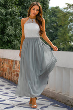 Elegant Maxi Dress with Asymmetric Halter and Layered Silhouette