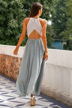 Elegant Maxi Dress with Asymmetric Halter and Layered Silhouette