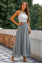 Elegant Maxi Dress with Asymmetric Halter and Layered Silhouette